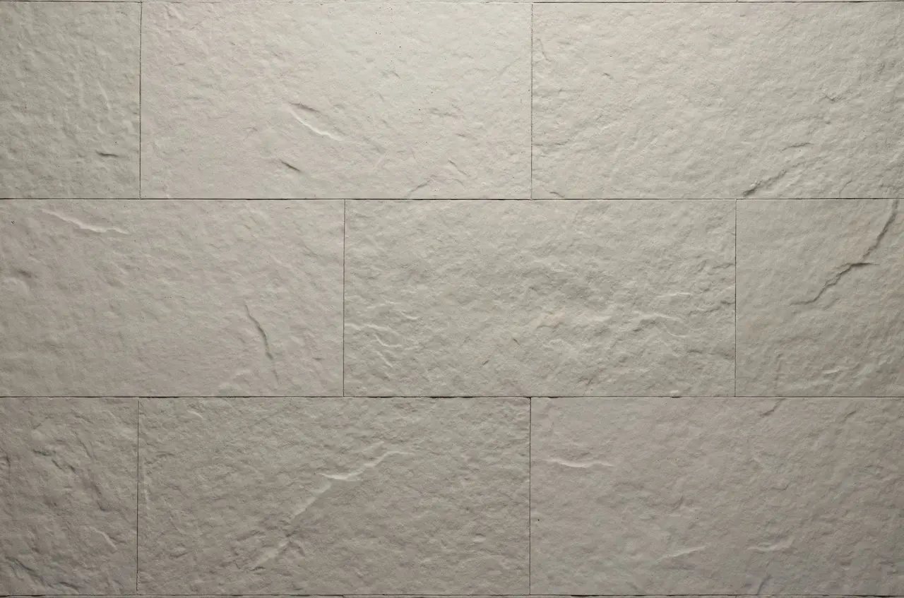 Beige R02 Tender Rock flexible tile with a natural stone relief laid with staggered joints