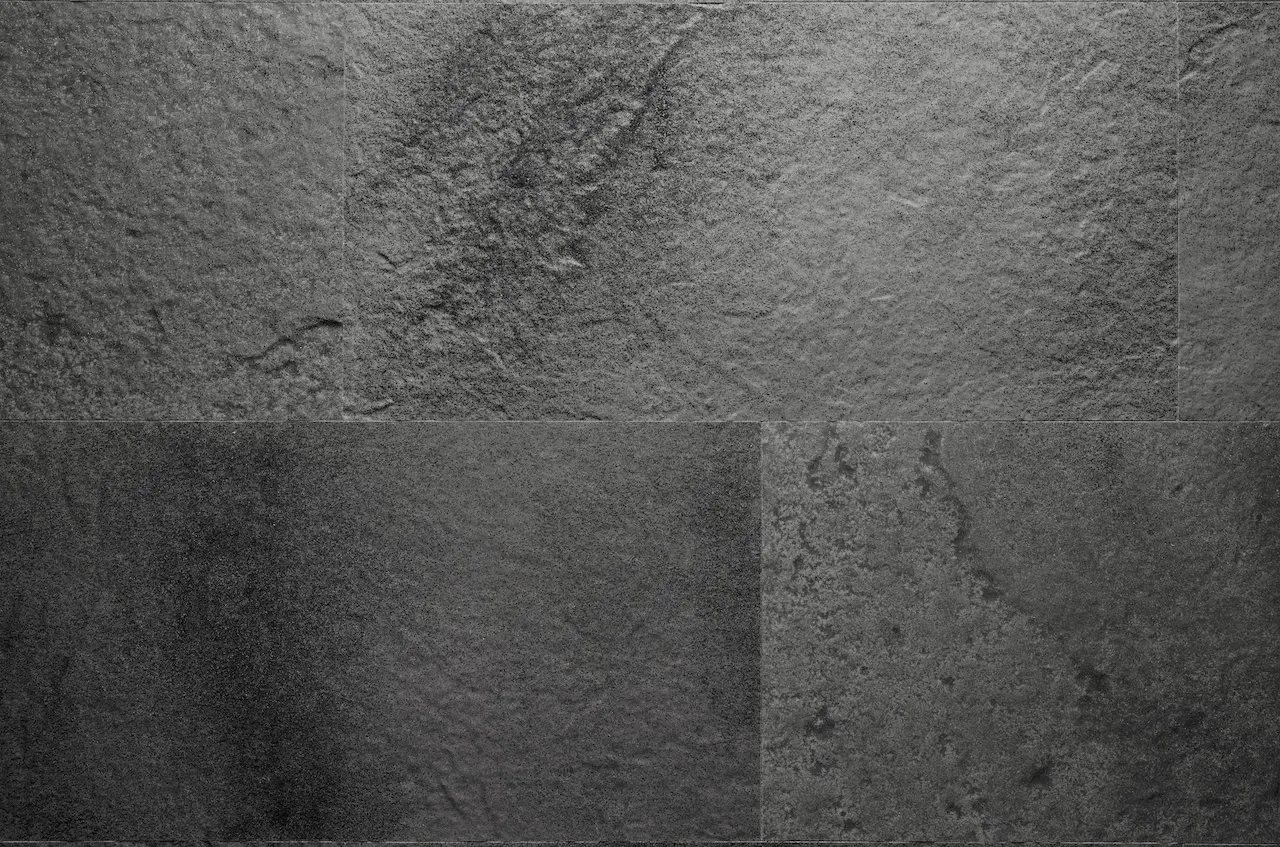 Dark grey R05 Gray Cold Rock flexible tile with a stone relief and white and black mineral flecks