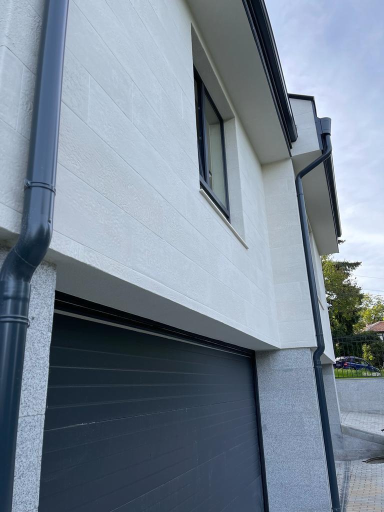 Germany — private house facade clad in flexible panels — 5