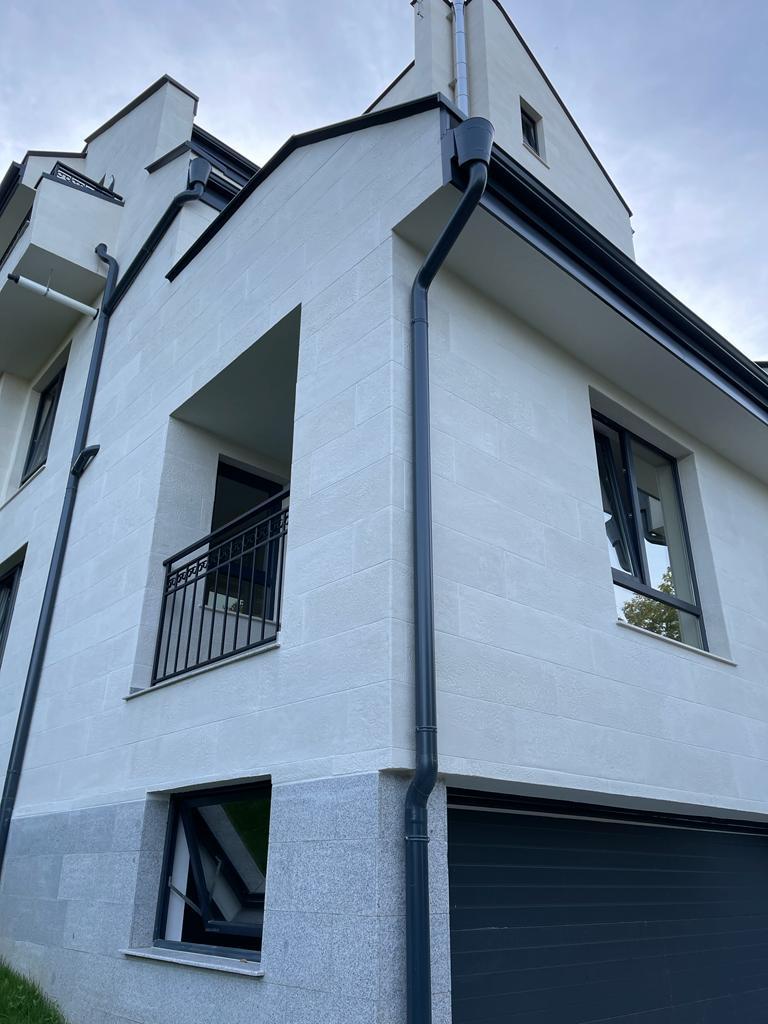 Germany — private house facade clad in flexible panels — 6