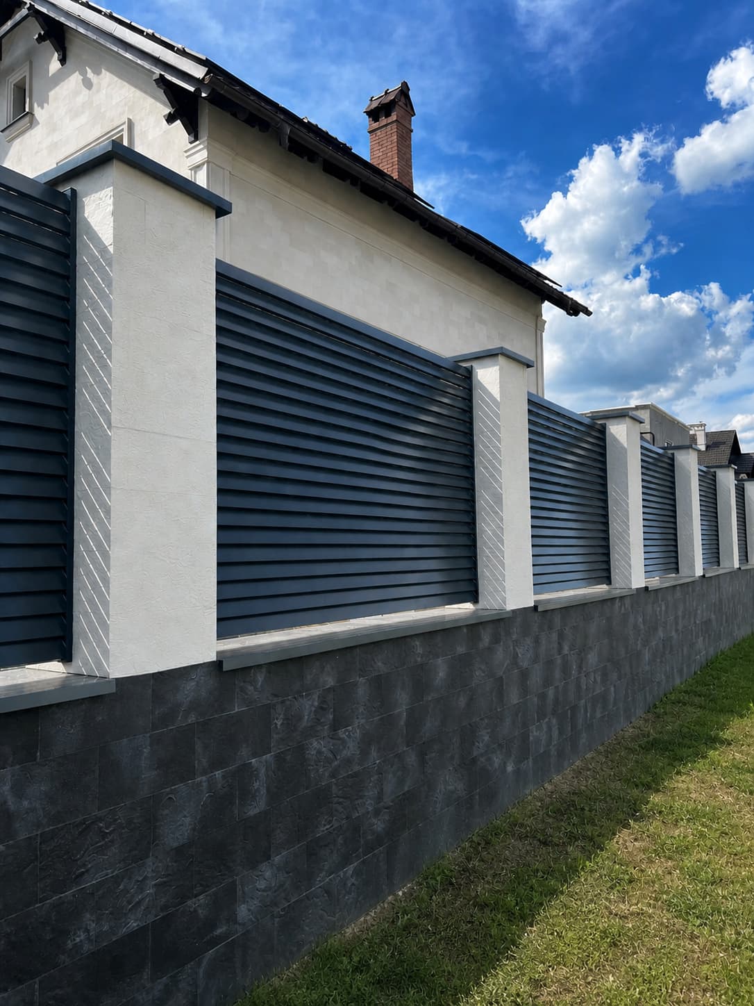 Ialoveni — the facade of a mansion clad in flexible tiles — 8