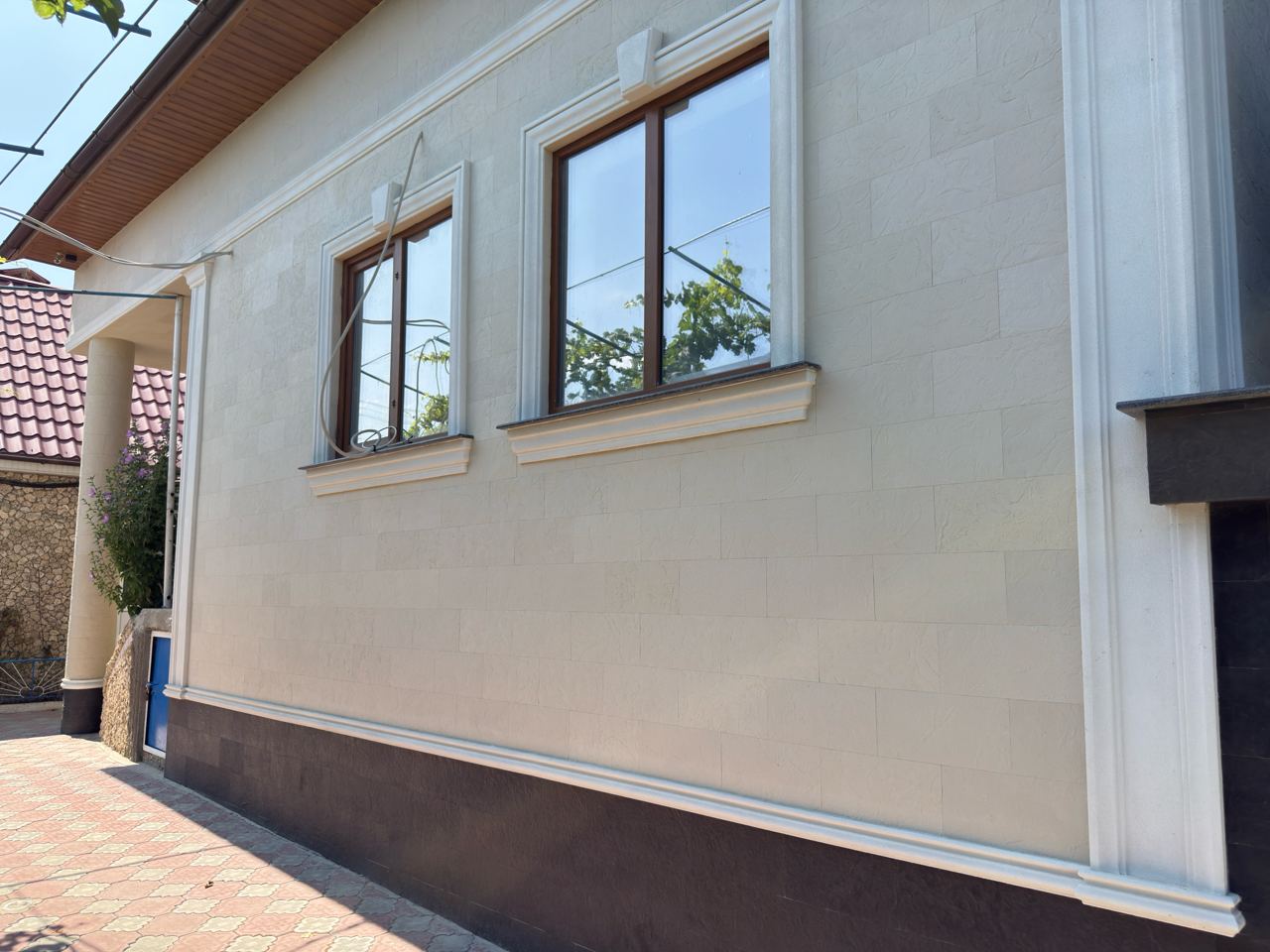 Pletaflex flexible facade cladding — house in Costești — 7