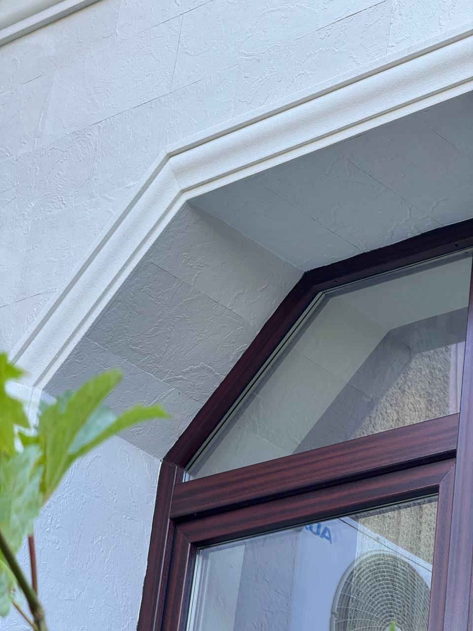 Flexible stone tiles for façades — house in Primaverii — 2