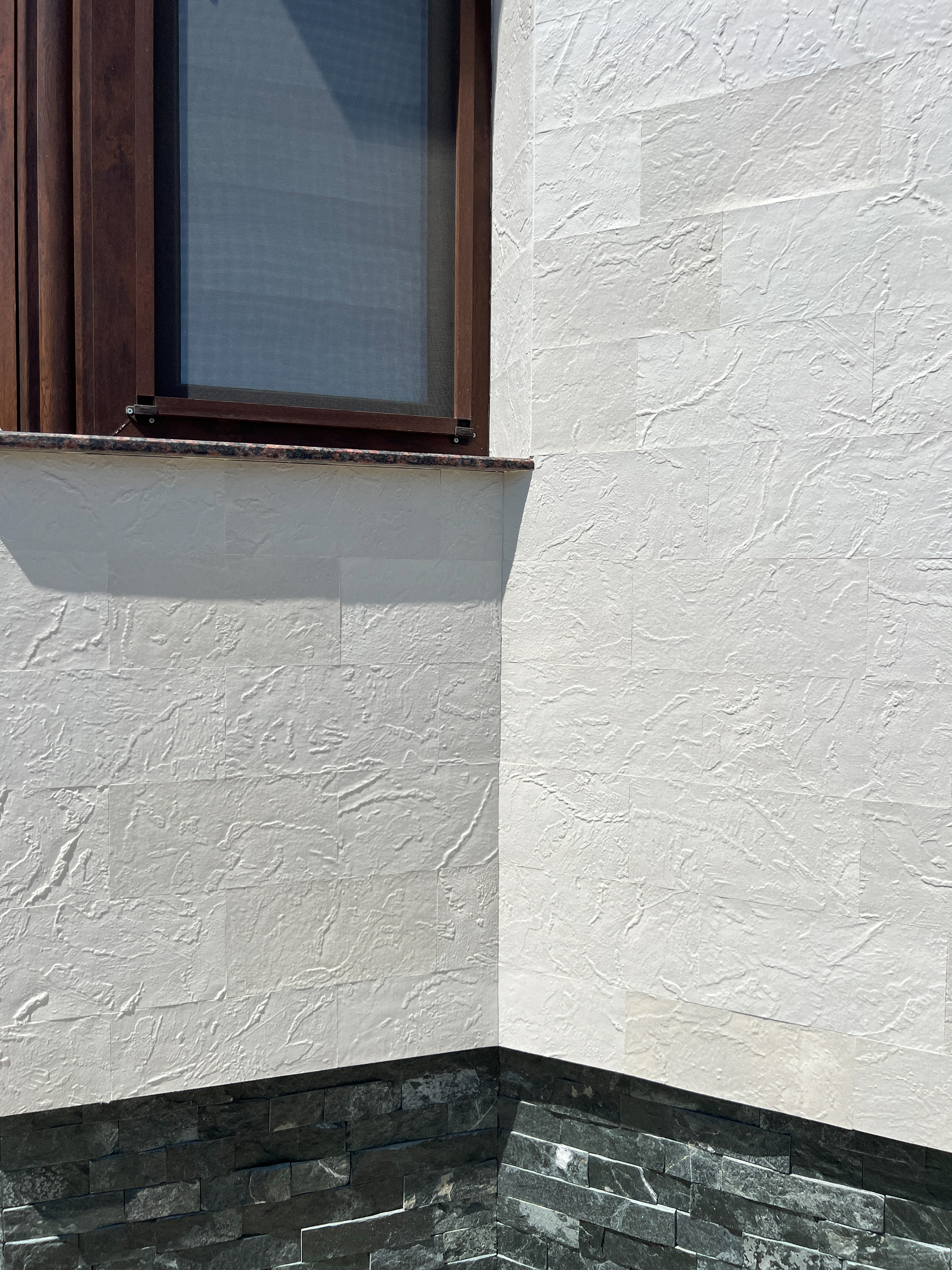 Flexible stone — the extended facade of a complex — 22